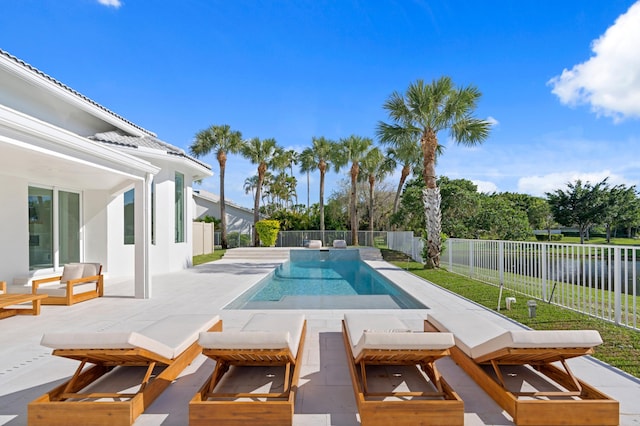 view of swimming pool with a patio area, a fenced backyard, and a fenced in pool