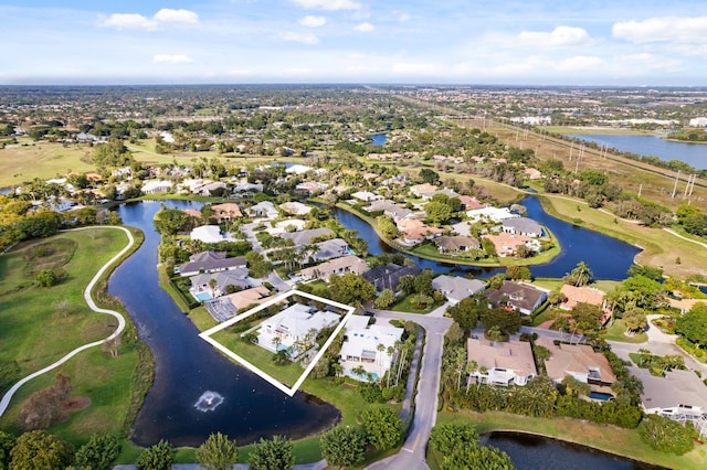 bird's eye view with a water view and a residential view