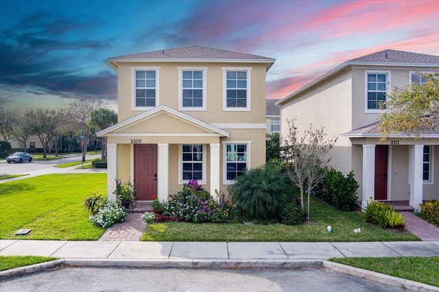 view of front house at dusk