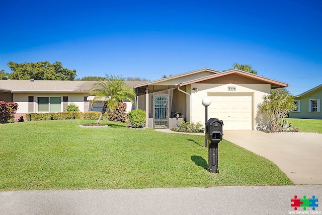 ranch-style house featuring stucco siding, an attached garage, concrete driveway, and a front yard