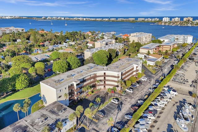 drone / aerial view with a water view and a view of city