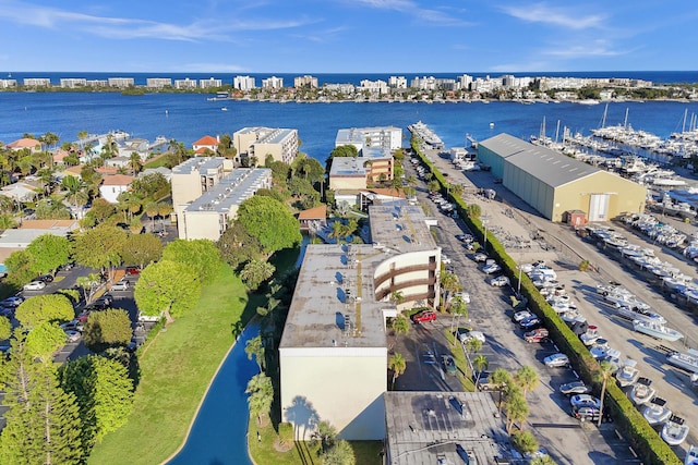 birds eye view of property featuring a water view