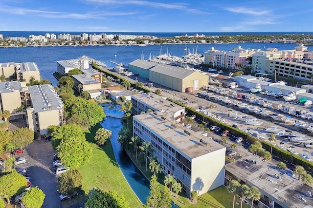 birds eye view of property featuring a water view