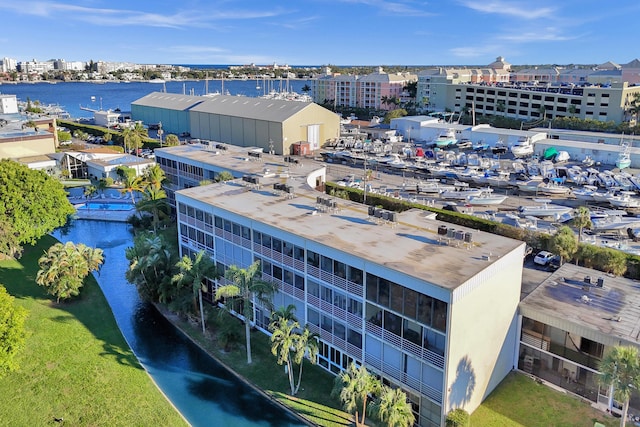 drone / aerial view with a water view and a city view