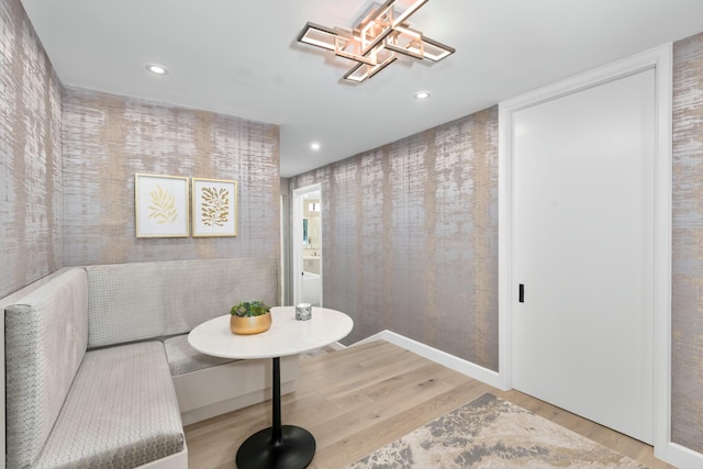 bathroom with wood finished floors and recessed lighting