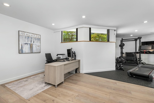 home office featuring recessed lighting, baseboards, and wood finished floors