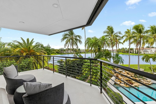 balcony featuring a water view