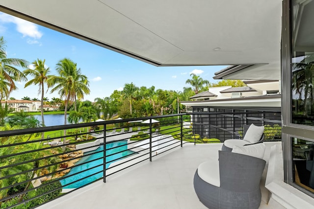 balcony featuring a water view