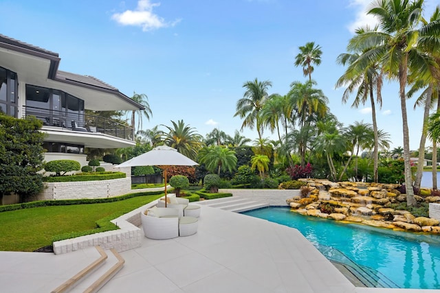 pool featuring a patio area