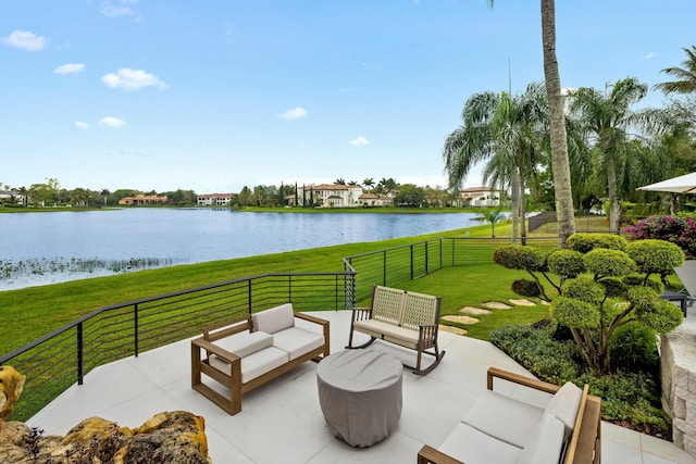 view of patio featuring a water view and outdoor lounge area