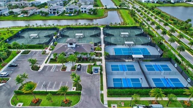 aerial view with a residential view and a water view