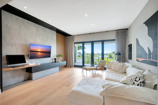 living room featuring wood finished floors and recessed lighting