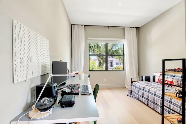 bedroom with wood finished floors