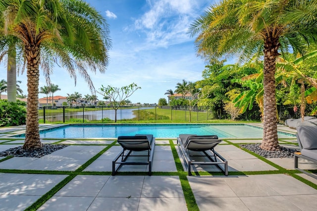 view of swimming pool featuring a fenced in pool, a patio area, and a fenced backyard