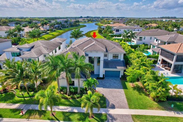 bird's eye view with a water view and a residential view