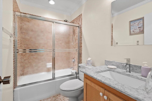 full bathroom featuring toilet, combined bath / shower with glass door, crown molding, and vanity