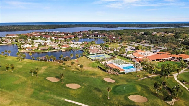 bird's eye view with a water view and golf course view