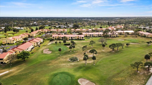birds eye view of property with a residential view and golf course view