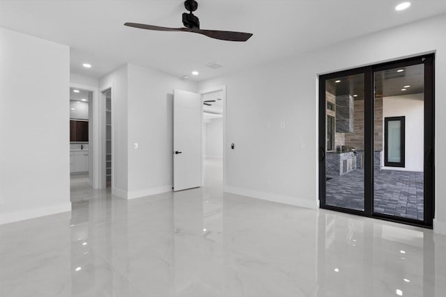 spare room featuring ceiling fan