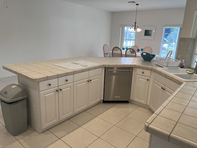 kitchen with visible vents, hanging light fixtures, an inviting chandelier, white cabinets, and light tile patterned flooring