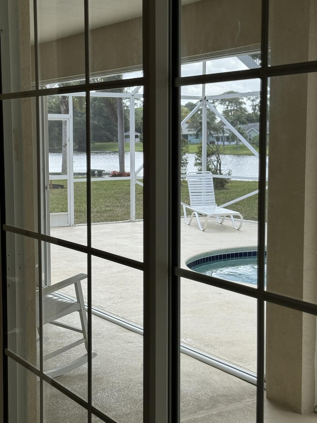 doorway featuring a water view