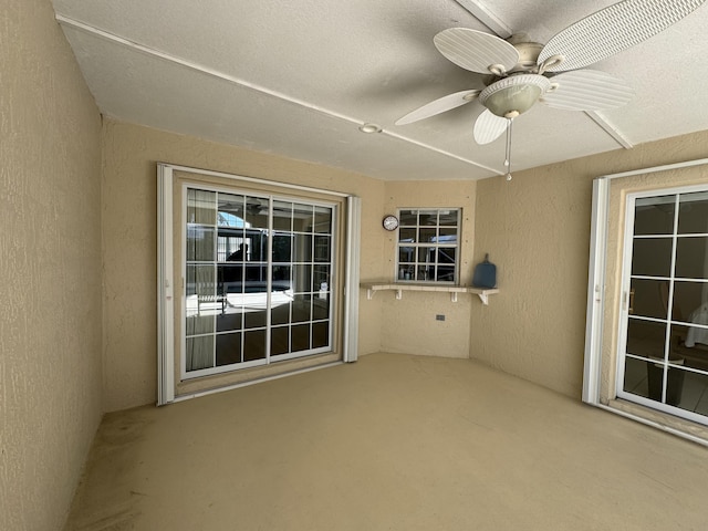 view of patio / terrace featuring ceiling fan