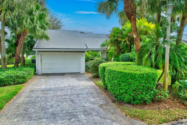 exterior space with a garage