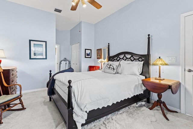 bedroom featuring carpet floors, a closet, visible vents, ceiling fan, and baseboards