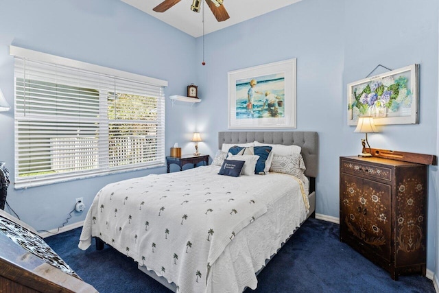 bedroom featuring carpet, baseboards, and a ceiling fan