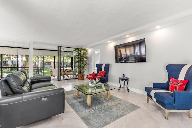 11205 Green Lake Dr Unit 201, Boynton Beach, FL 33437 - living area with a wall of windows, baseboards, a textured ceiling, and recessed lighting