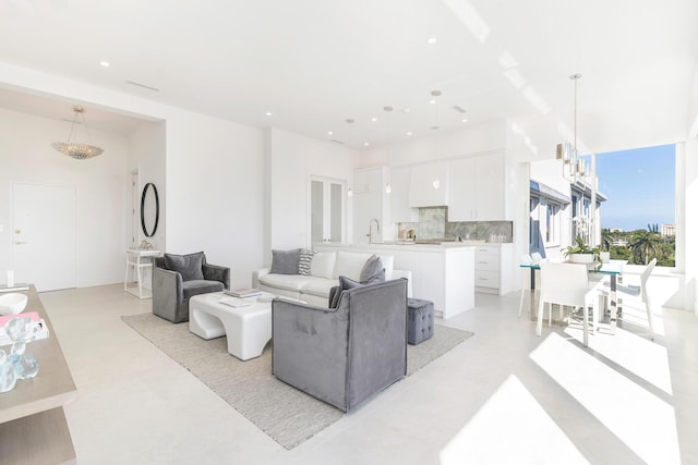 living room with recessed lighting and light floors