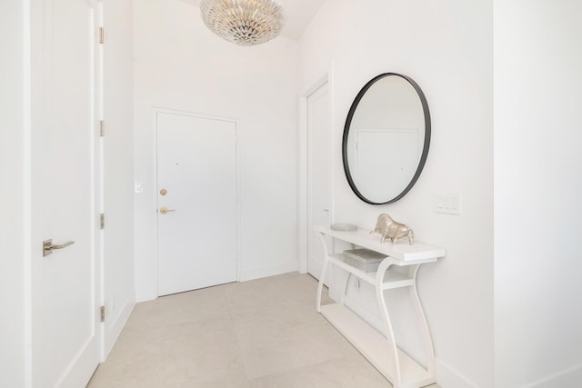 entryway featuring light tile patterned floors