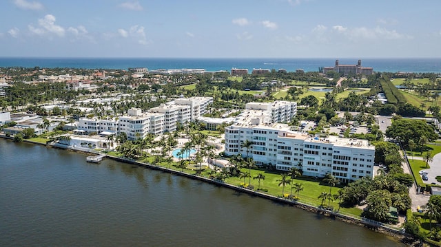 bird's eye view featuring a view of city and a water view