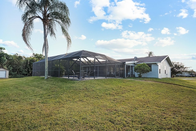 back of property with a patio and a lawn