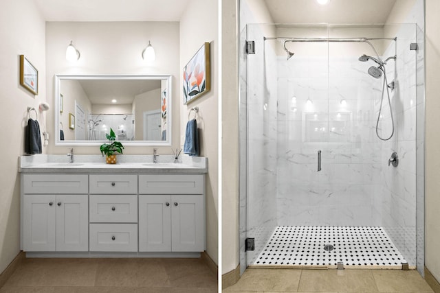 bathroom featuring tile patterned flooring, an enclosed shower, and vanity