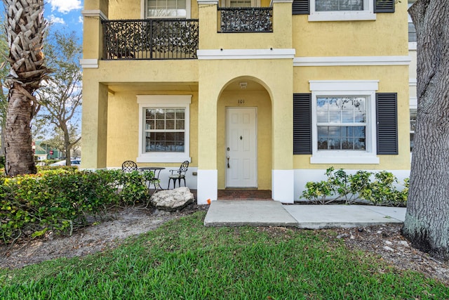 doorway to property with a balcony