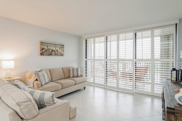 living room featuring a wall of windows