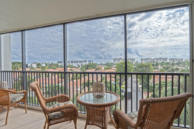 sunroom with a city view