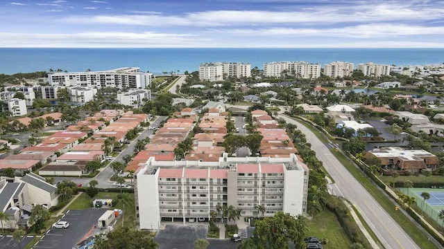 drone / aerial view with a view of city and a water view