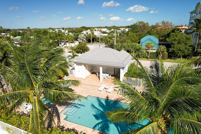 view of swimming pool featuring a patio area