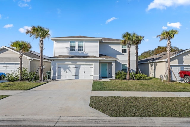 front facade featuring a front yard and a garage