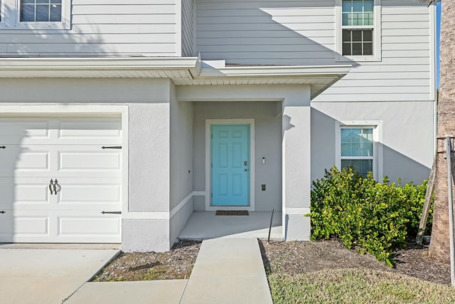 entrance to property with a garage