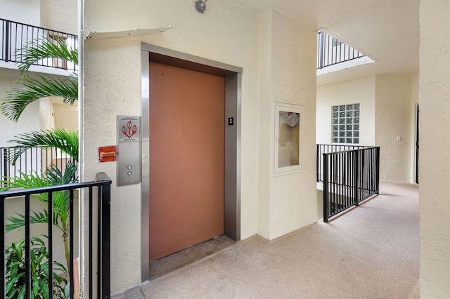 entrance to property featuring elevator