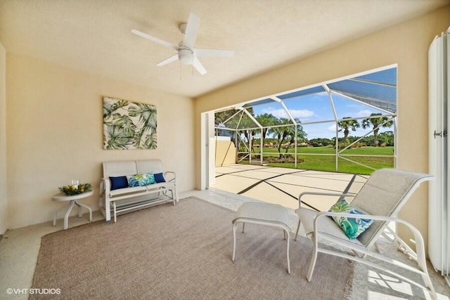 interior space with ceiling fan