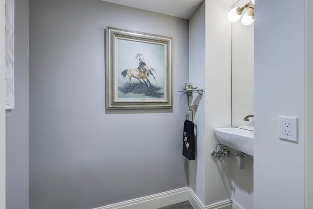 bathroom featuring baseboards