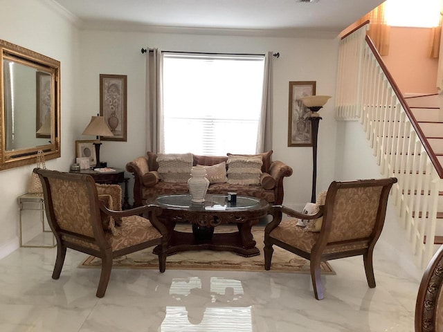 sitting room with crown molding