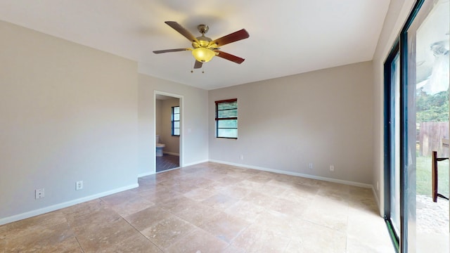 unfurnished room featuring ceiling fan