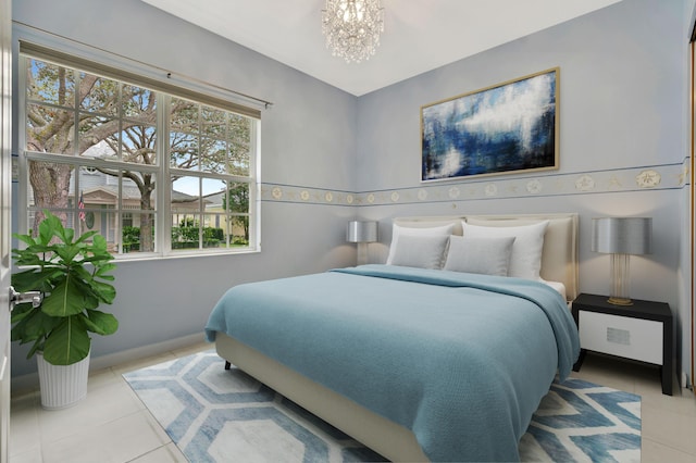 bedroom with baseboards, light tile patterned flooring, and an inviting chandelier