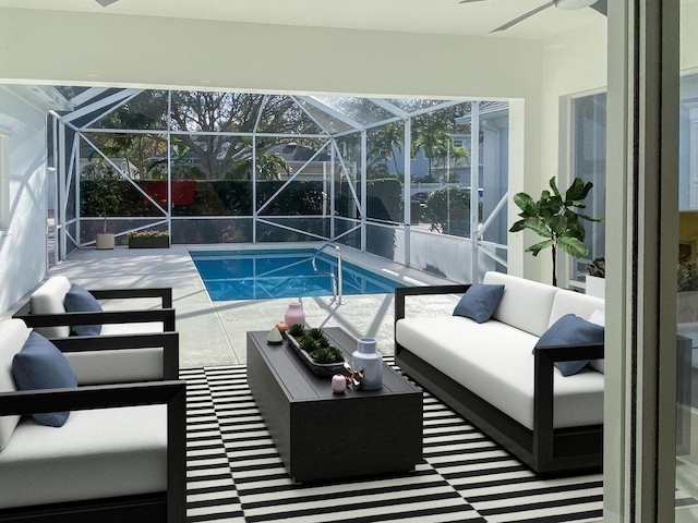 outdoor pool with glass enclosure, an outdoor living space, a ceiling fan, and a patio