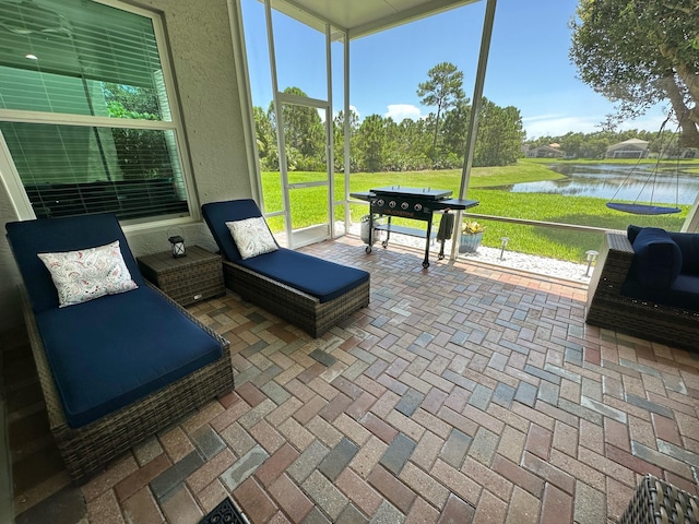 sunroom with a water view